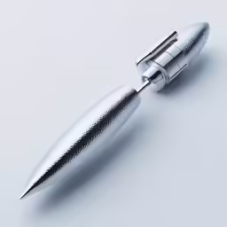 a silver fountain pen is on the table