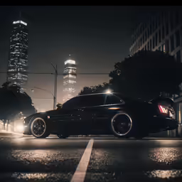 a black car parked on the side of the road