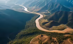 aerial view of river near mountains in alpine area