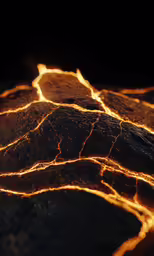 flames glowing from an outdoor cooking device next to black wall