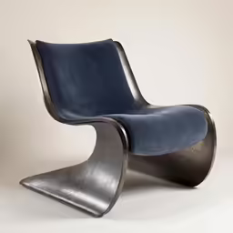a large chair made from metal and leather