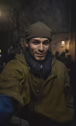 there is a man wearing a knit hat and scarf in this picture