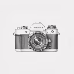 a sketch of an old camera on white paper
