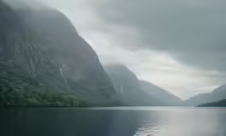 a large body of water surrounded by mountains
