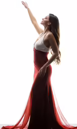 a woman in a red and white dress posing for a photo