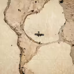 the view from the airplane of a water trail
