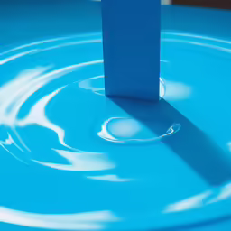 a blue round object with white circles around it