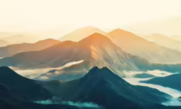 the mountains are covered in mist in the daytime