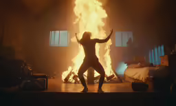 the dancer has on fire to entertain her audience