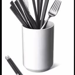 an assortment of utensils in a cup with a quote