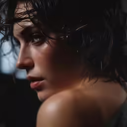 close up photograph of female with wet hair