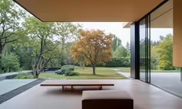 there are benches in the lobby of this modern house