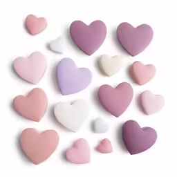 heart shaped sugars in different colors arranged in rows