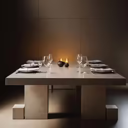 a table is set with silverware and place setting