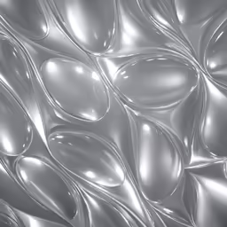 a wall of shiny metal that has a wavy design on it
