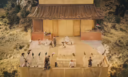 a stage set with a lot of people in it