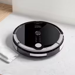a small robot is laying on a table