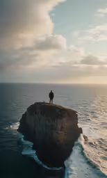 a person standing on top of a small island