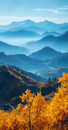 a view of the mountains with the mist rolling