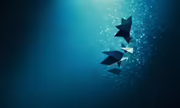 three paper boats are floating in the ocean