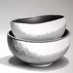 there are three bowls on the table