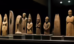 a display of terracotta depicting people and people