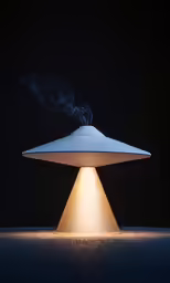 an illuminated white object with smoke coming out of it