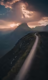 there is a road that can be seen on the side of the mountain