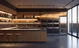 this kitchen is in a luxury suite with its large open space