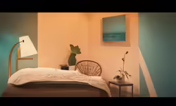 a bed with a white blanket and green plant