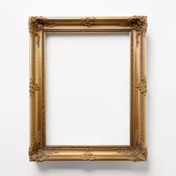 an old golden frame on the wall
