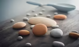 small stones are scattered in the floor to create a geometric pattern