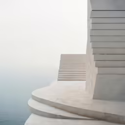 two concrete steps and an empty pool
