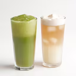 two drinks next to each other, one in green and one in light yellow