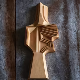 wooden carving that is very intricately detailed and useful