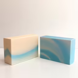 an image of two soap bars on white background