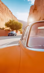 a small car that is driving by some buildings