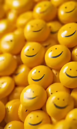 the yellow balls are full of smiley faces