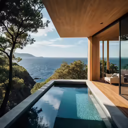 an indoor pool is overlooking the ocean
