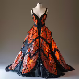 a dress that has an orange and black pattern