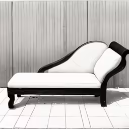 black and white couch sits in front of a building