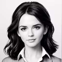a woman posing for a black and white picture