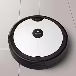 a roomba with an appliance on it is shown