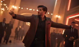 a man in a suit and tie walking through a room