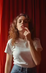 a woman is looking away while posing for a picture