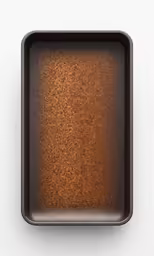 brown plate on white wall with copy space