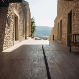 a wood table in a stone walled house
