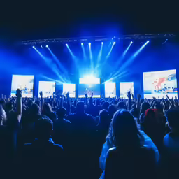 a crowd of people at a music event