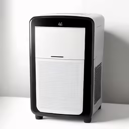 a large computer case is next to a white wall