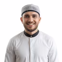 a man wearing an outfit posing for a photo